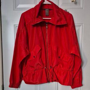 "Sharon Young". Light weight utility jacket. S. Drawstring at waist and neck.